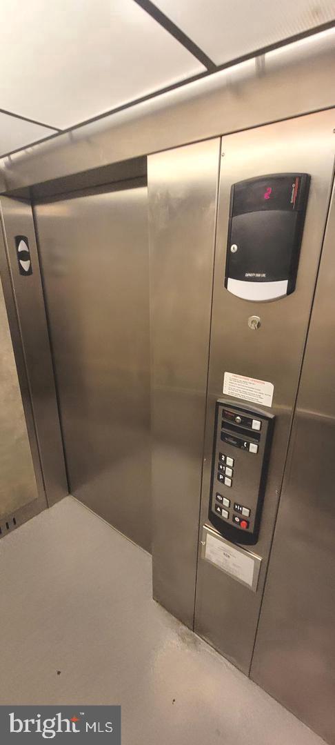 75 Maple Street, Unit 202 Conshohocken, PA 19428 - Photo 27 of 36 a bathroom with a shower and a mirror