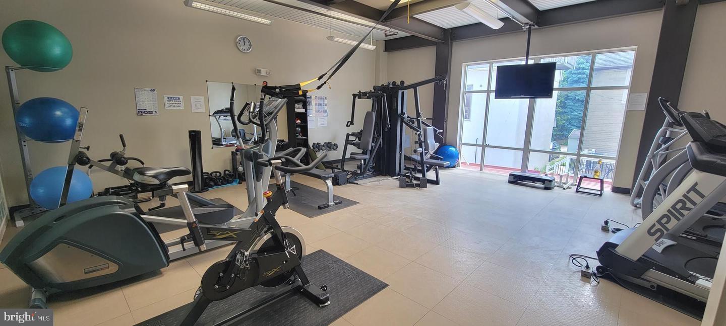 75 Maple Street, Unit 202 Conshohocken, PA 19428 - Photo 28 of 36 a view of a room with gym equipment