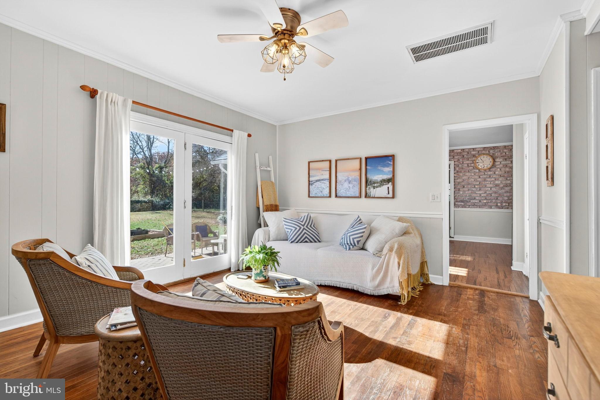 18321 Carrico Mills Road Stevensburg, VA 22741 - Photo 15 of 62 a living room with furniture and a large window