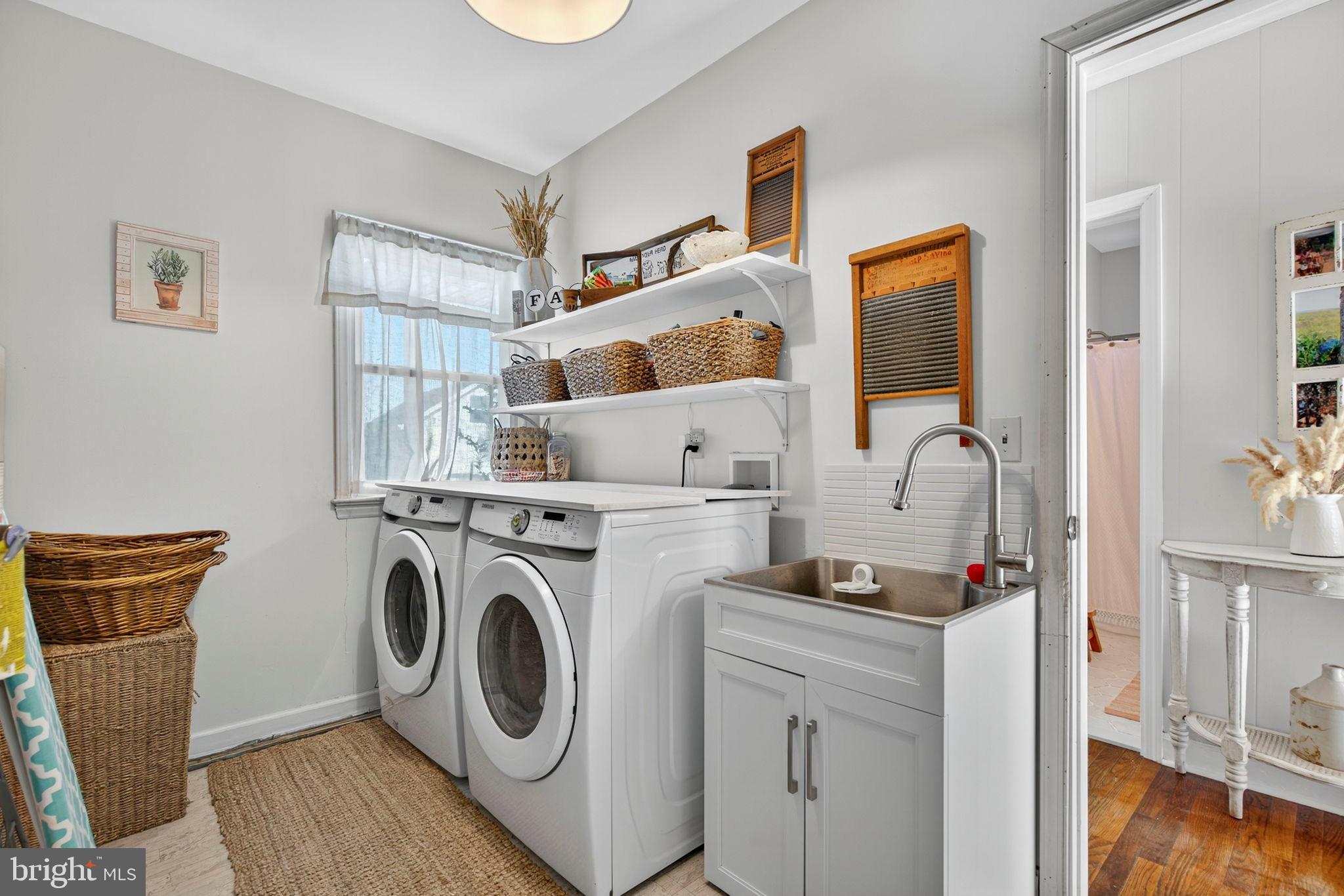 18321 Carrico Mills Road Stevensburg, VA 22741 - Photo 16 of 62 a view of kitchen and living room with wooden floor