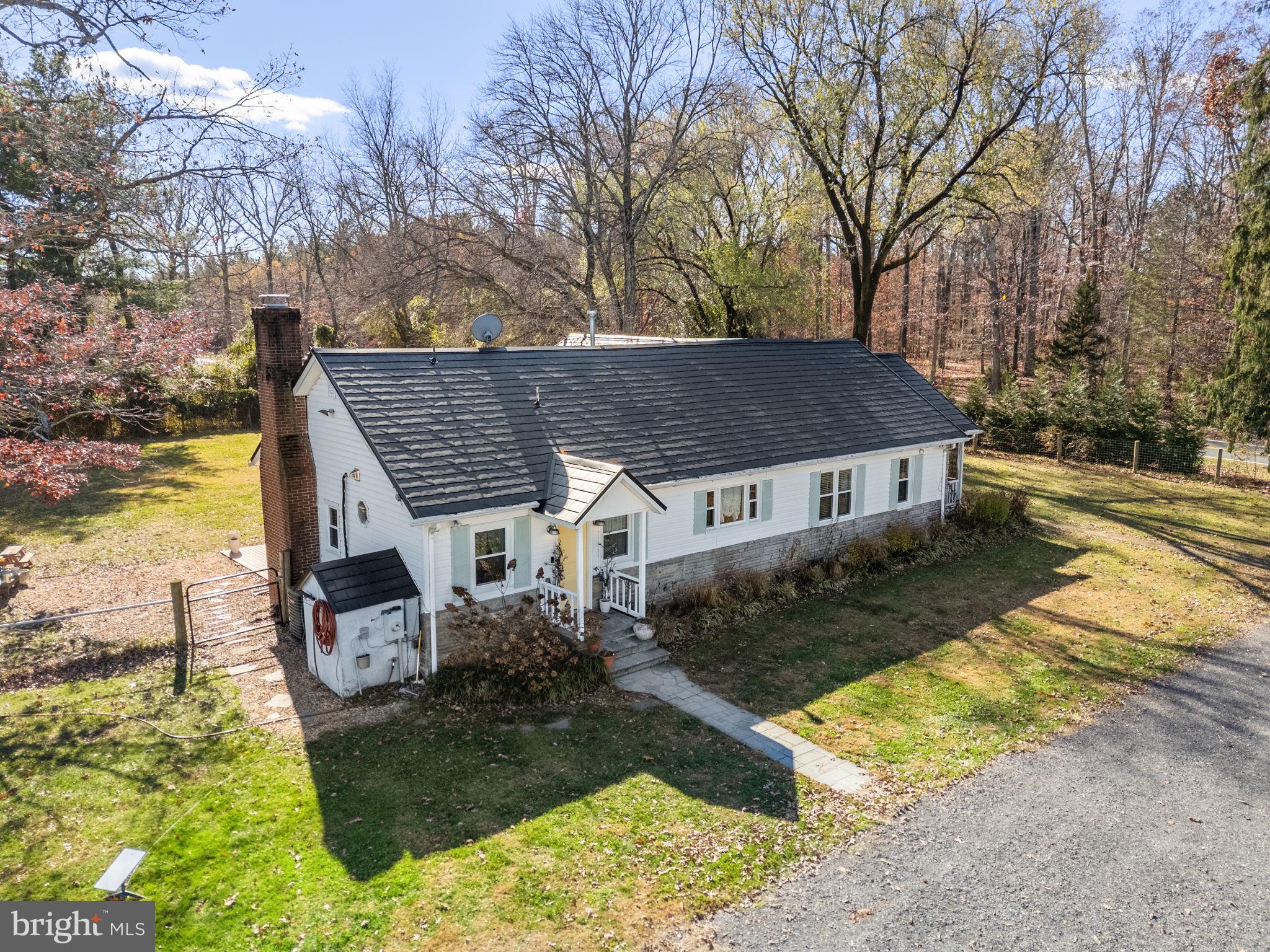 18321 Carrico Mills Road Stevensburg, VA 22741 - Photo 60 of 62 a view of a house with backyard