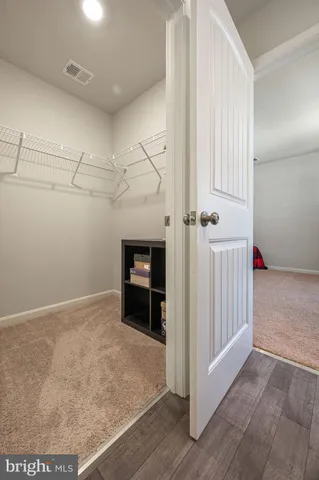 a view of a room with an empty space