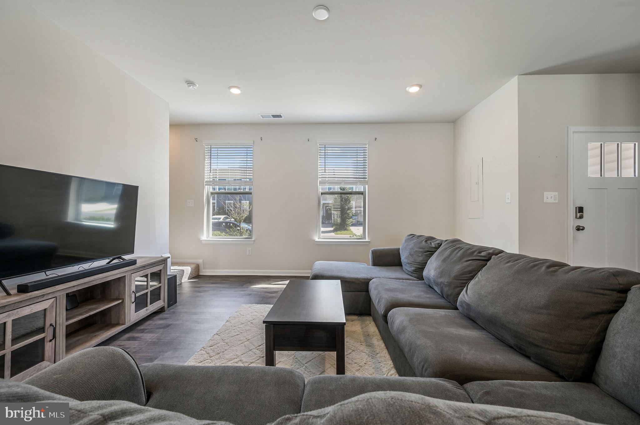 49 Citrus Drive Camden Wyoming, DE 19934 - Photo 8 of 27 a living room with furniture and a flat screen tv