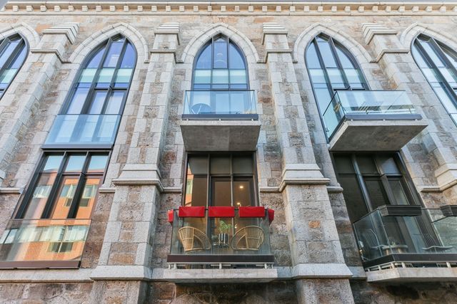a view of staircase with wooden floor