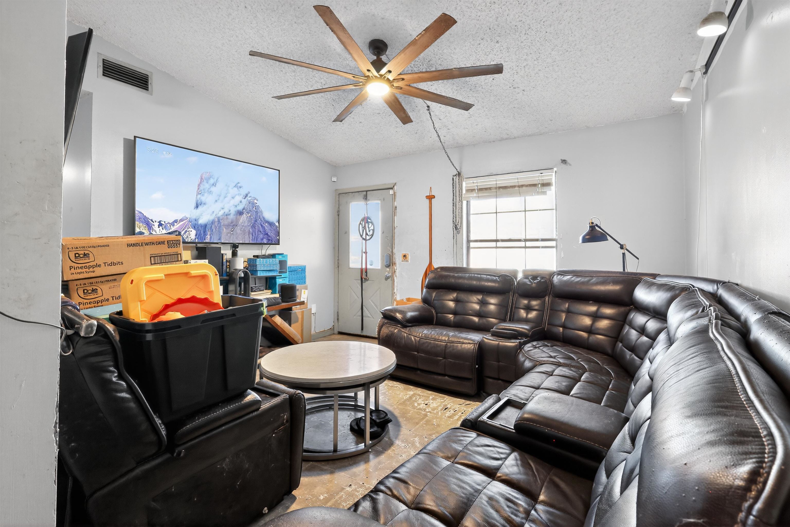 130 Cornell Road St. Augustine, FL 32086 - Photo 3 of 24 a living room with furniture a flat screen tv and a couch