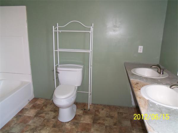 36 Branch Street Fall River, MA 02721 - Photo 8 of 8 a bathroom with a toilet and a sink