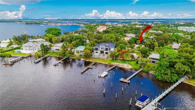 a view of a swimming pool with an outdoor space and seating area
