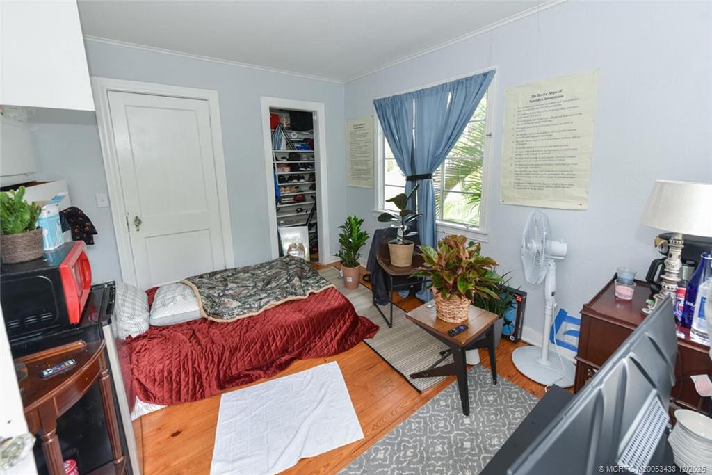 817 Southwest St Lucie Crescent Stuart, FL 34994 - Photo 24 of 25 a living room with furniture and a window