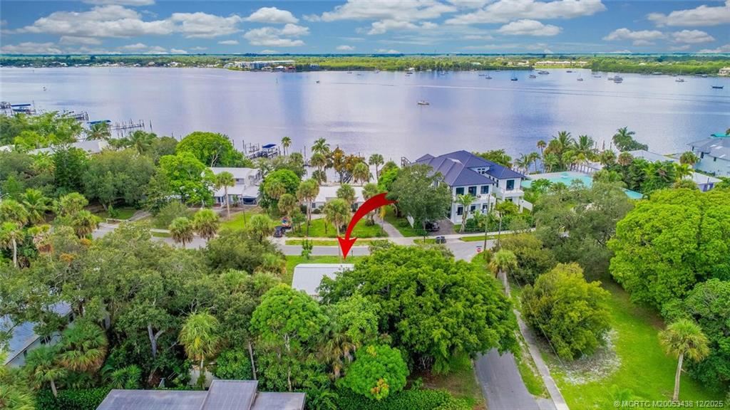 817 Southwest St Lucie Crescent Stuart, FL 34994 - Photo 25 of 25 a view of a lake with a lake in the background