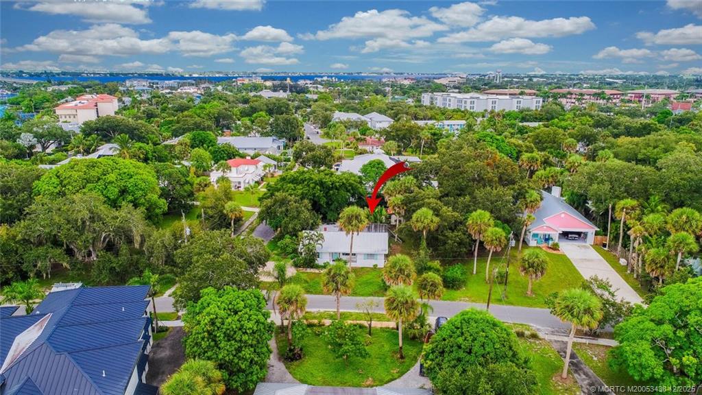 817 Southwest St Lucie Crescent Stuart, FL 34994 - Photo 6 of 25 a view of a garden with an buildings and street view