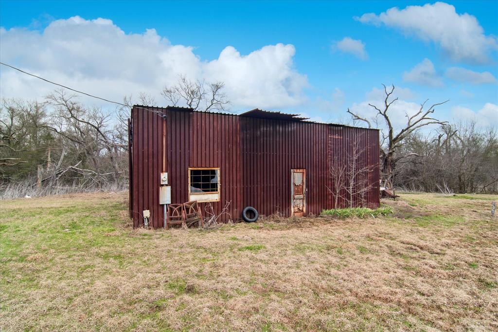 5809 Anne Avenue Kaufman, TX 75142 - Photo 3 of 13 a view of outdoor space with wooden fence