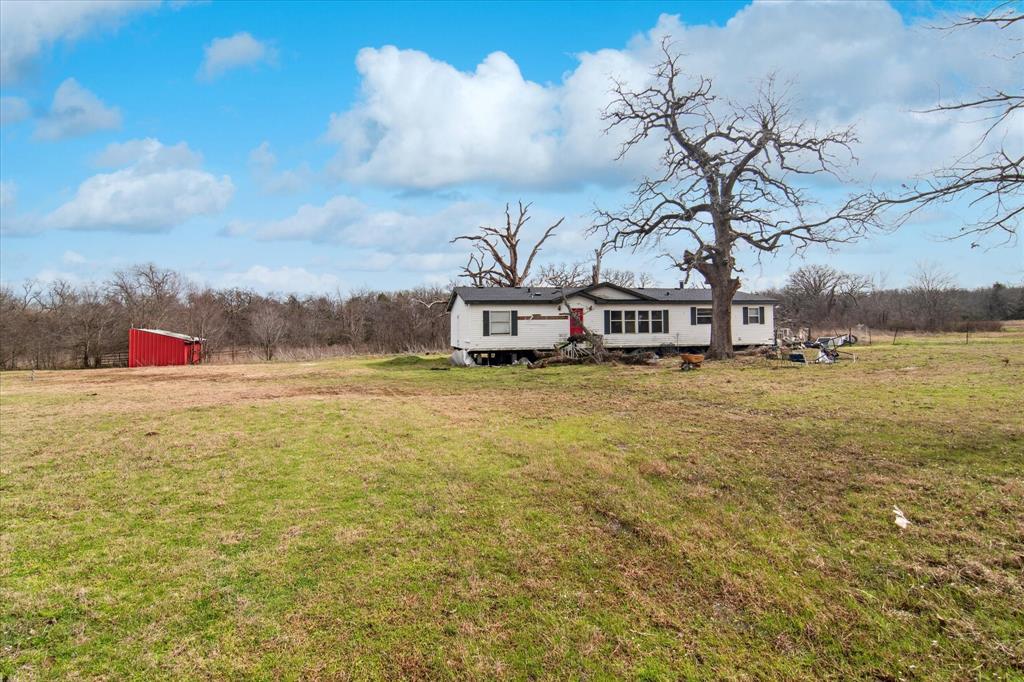 5809 Anne Avenue Kaufman, TX 75142 - Photo 8 of 13 a view of a large body of water with a building in the background