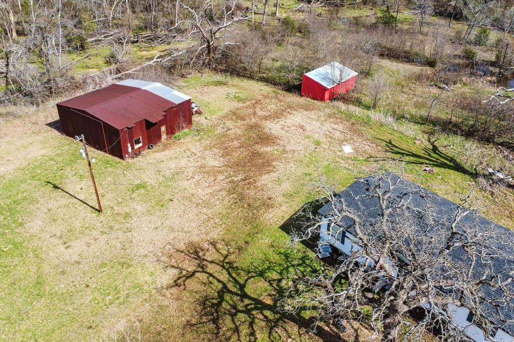 5809 Anne Avenue Kaufman, TX 75142 - Photo 9 of 13 a bathroom with a sink and a mirror