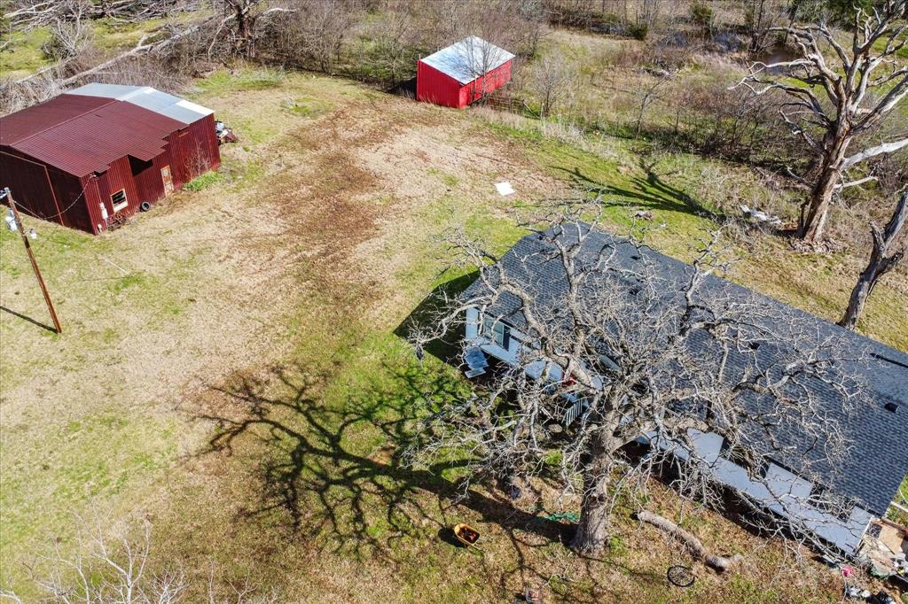 5809 Anne Avenue Kaufman, TX 75142 - Photo 10 of 13 a bathroom with a bathtub