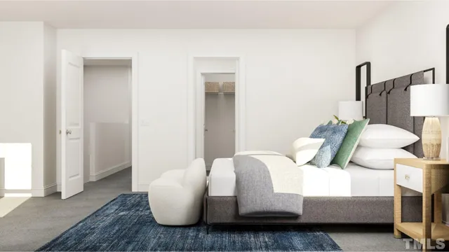 a living room with furniture and a lamp