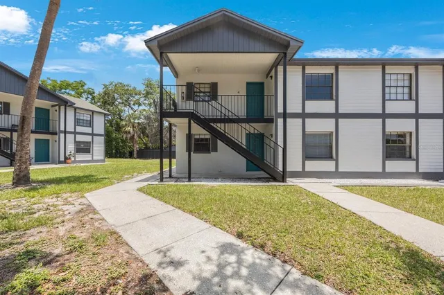 a view of a house with swimming pool