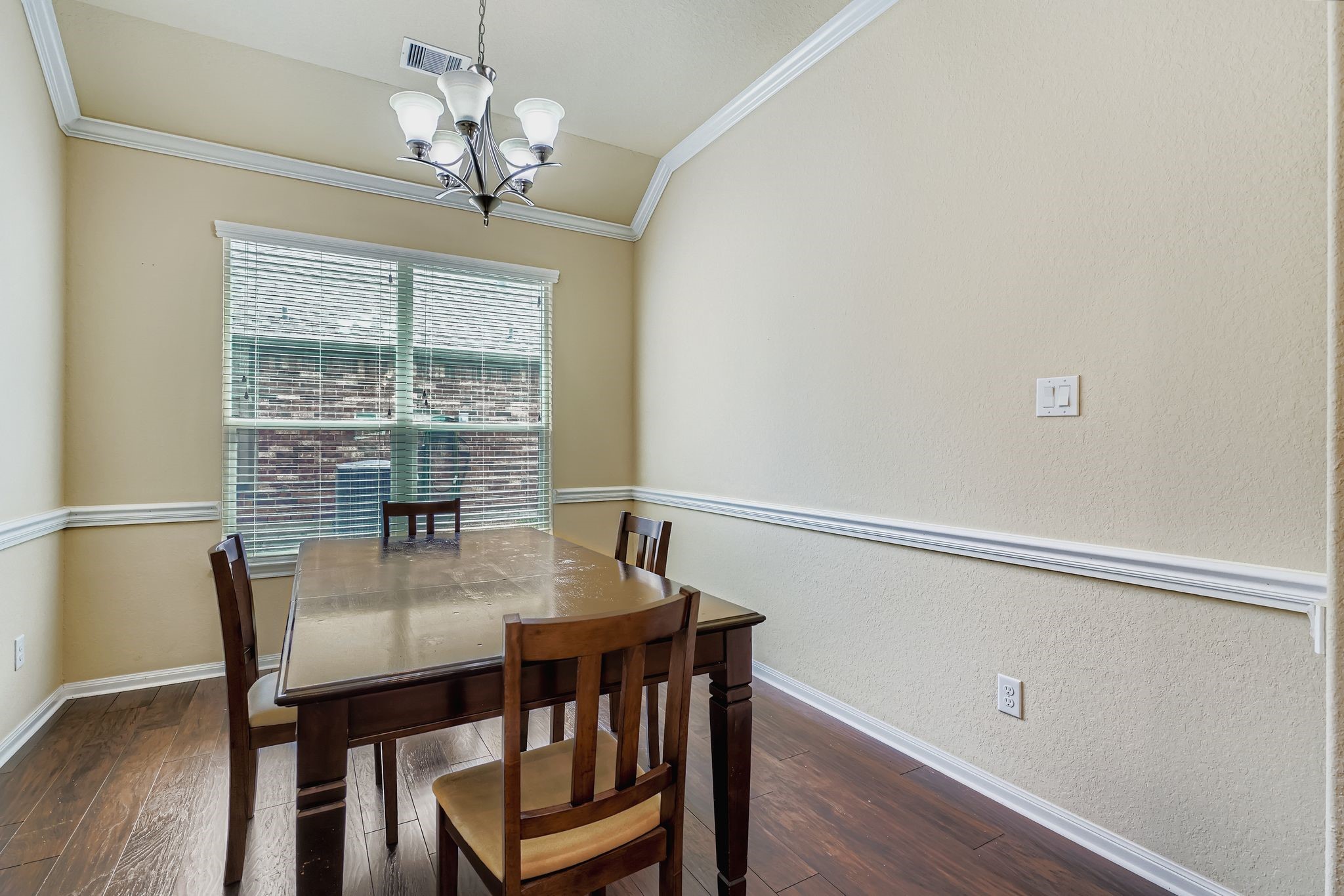2227 Wembley Way Rosenberg, TX 77471 - Photo 8 of 27 a view of a dining room with furniture window and wooden floor