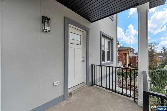 a view of a house with a porch