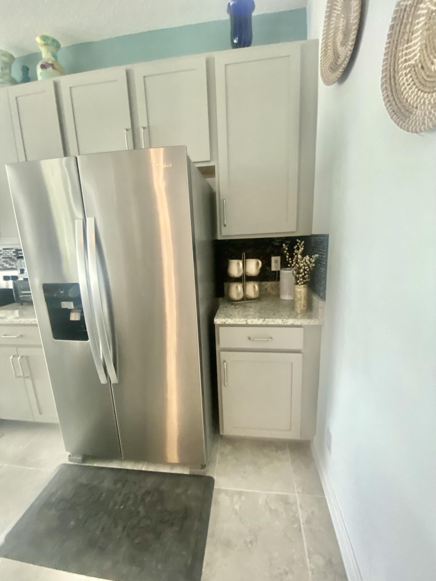 656 Southwest Haas Avenue Port St. Lucie, FL 34953 - Photo 14 of 31 a utility room with dryer and washer