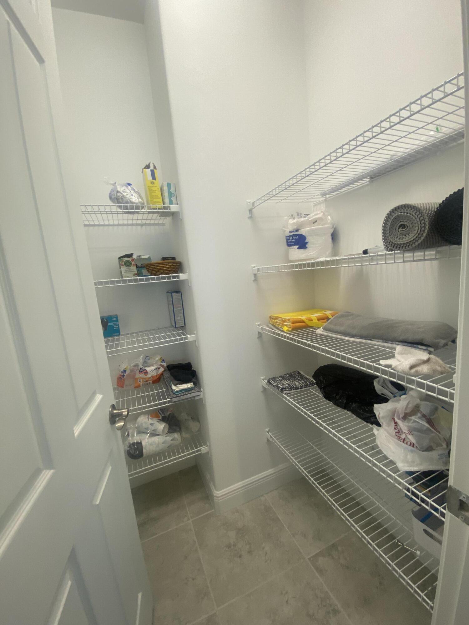 656 Southwest Haas Avenue Port St. Lucie, FL 34953 - Photo 15 of 31 a kitchen with a sink and a stove