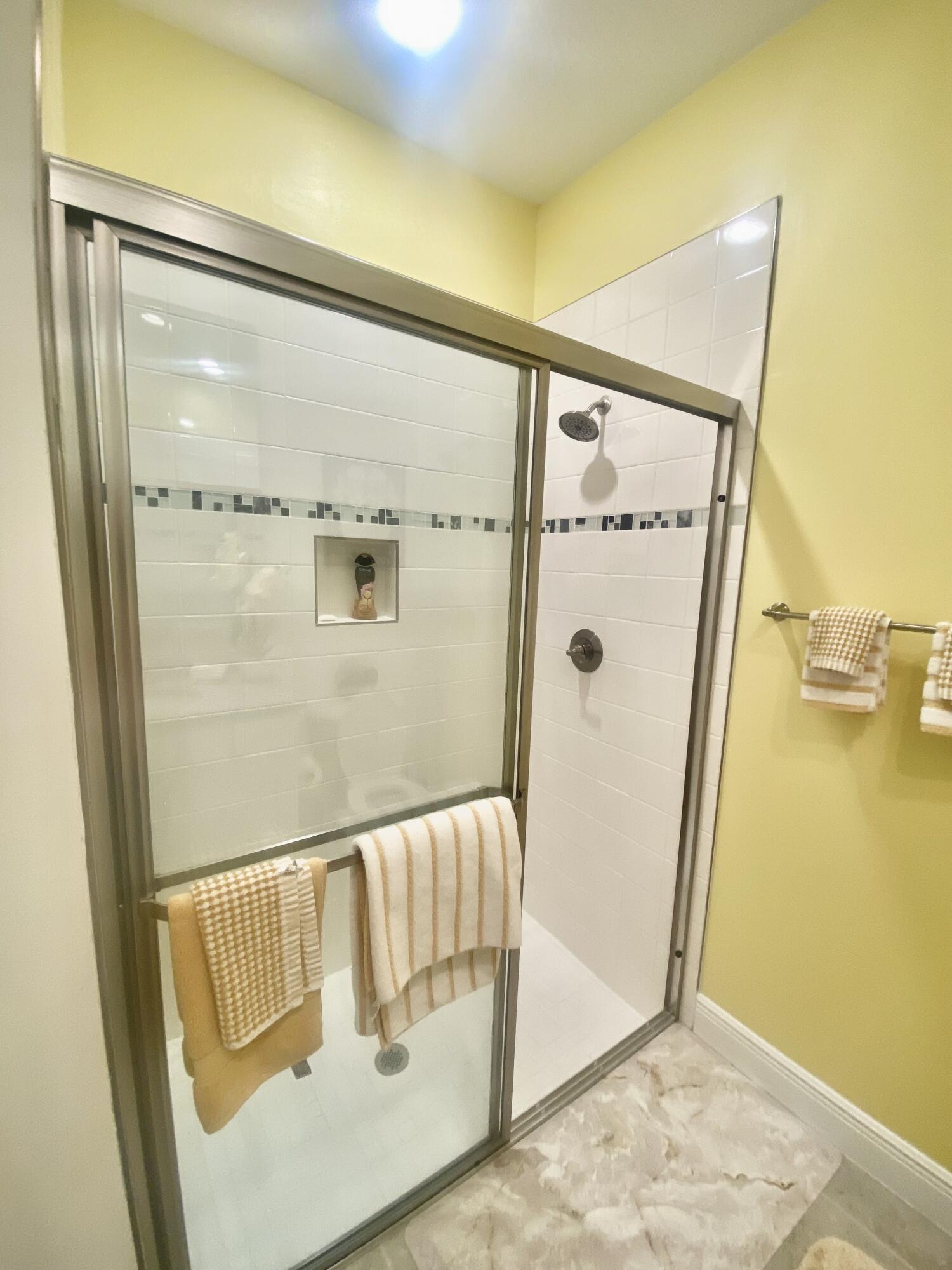 656 Southwest Haas Avenue Port St. Lucie, FL 34953 - Photo 27 of 31 a bathroom with a shower