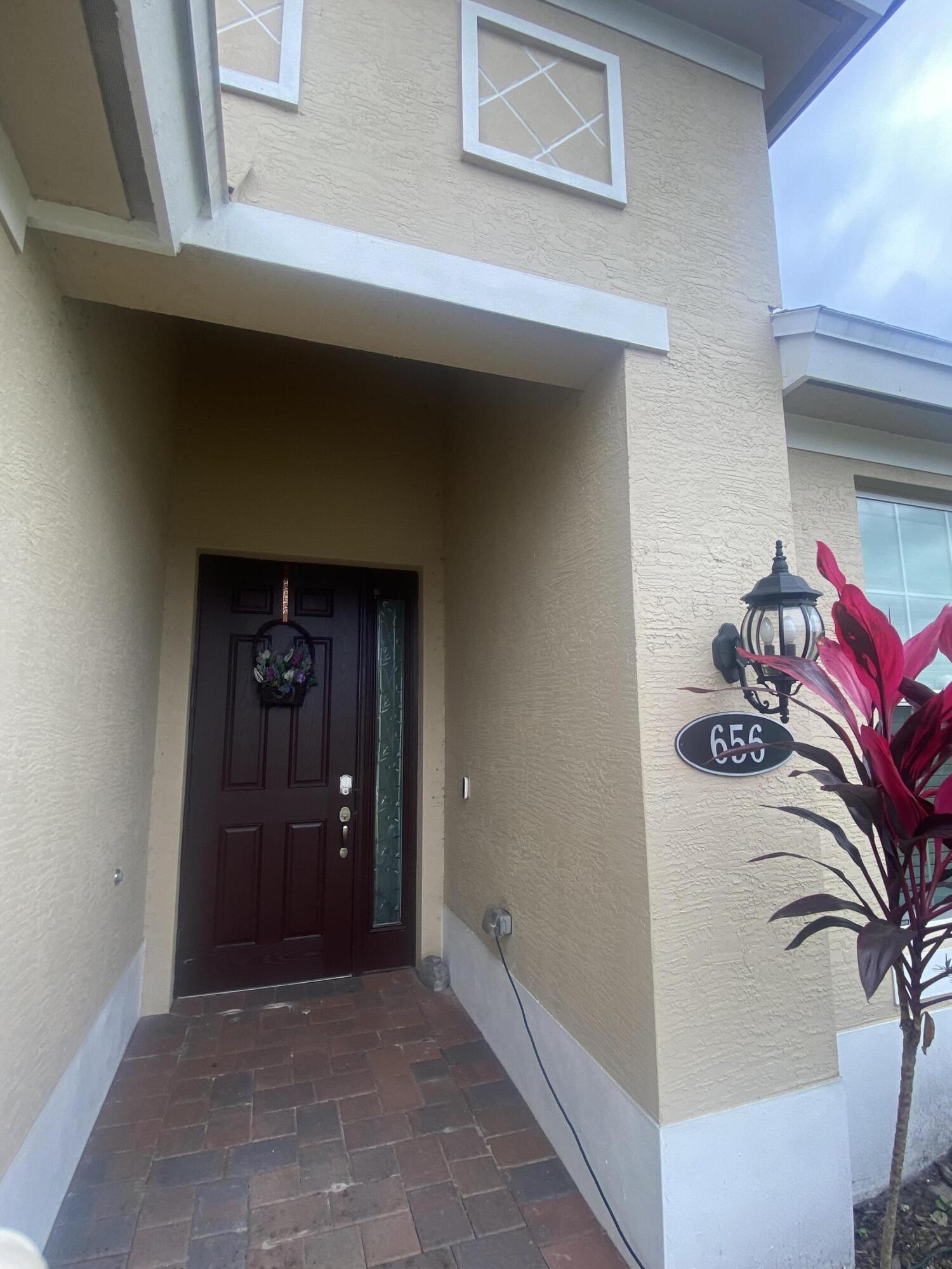 656 Southwest Haas Avenue Port St. Lucie, FL 34953 - Photo 3 of 31 a view of a living room with closet