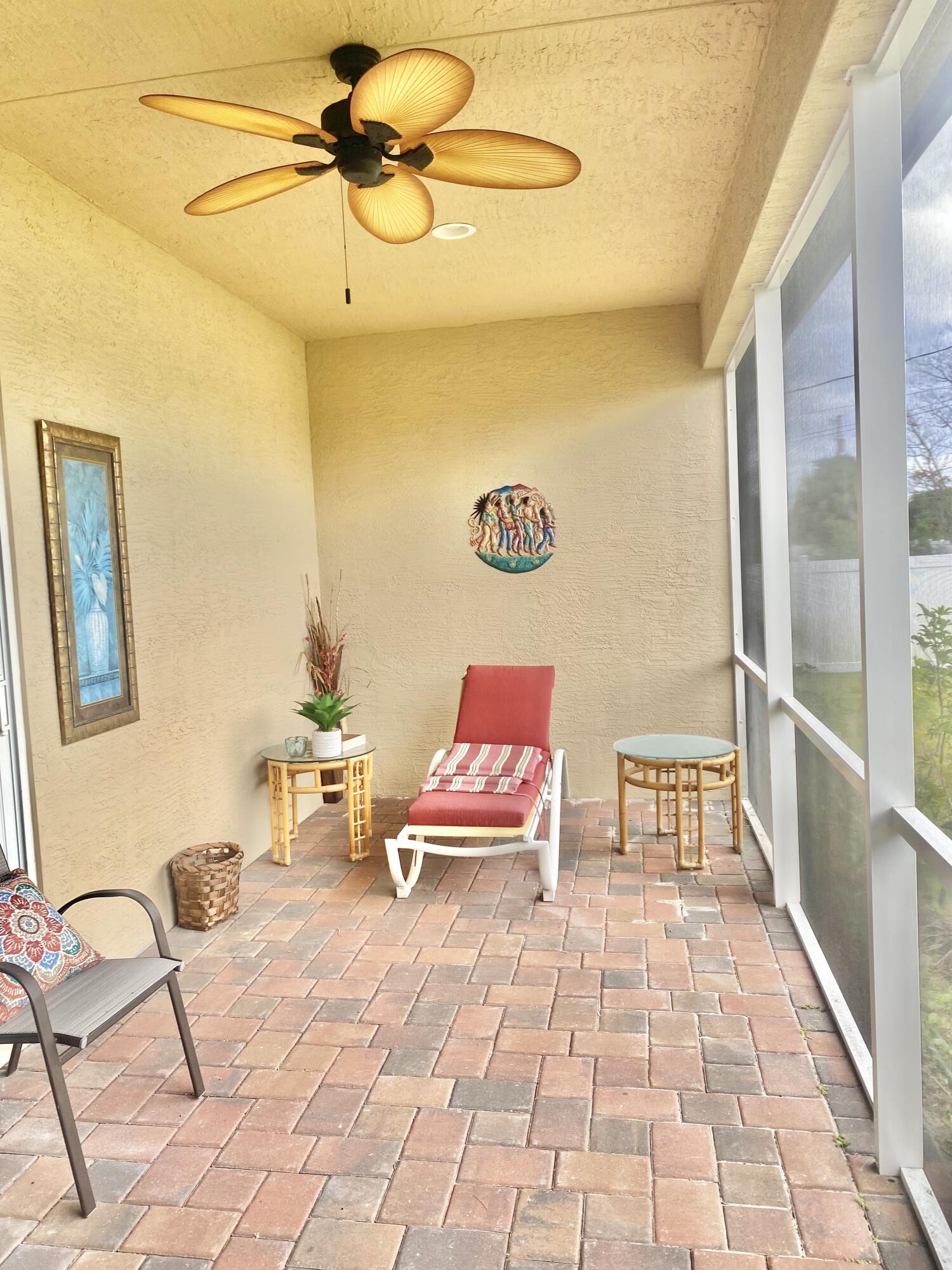 656 Southwest Haas Avenue Port St. Lucie, FL 34953 - Photo 5 of 31 a bedroom with a bed and the view of balcony