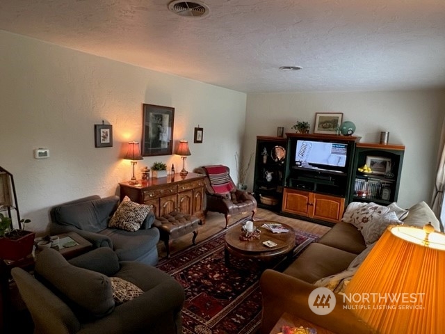 1505 J Street Walla Walla, WA 99362 - Photo 2 of 11 a living room with furniture and a wooden floor
