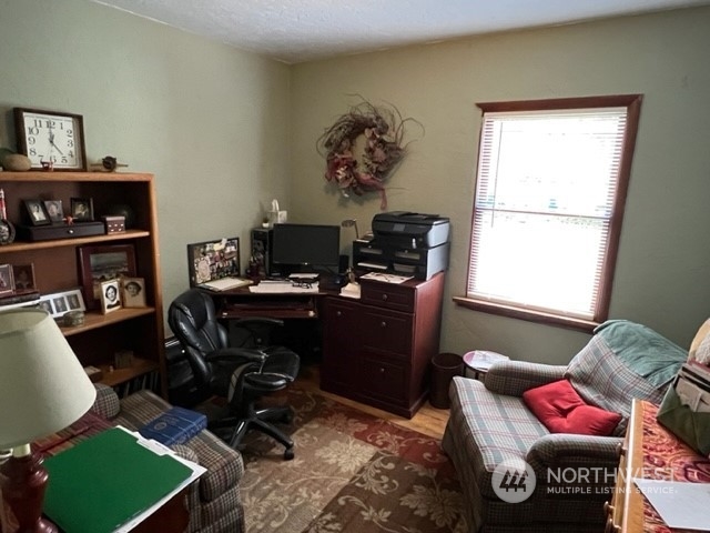 1505 J Street Walla Walla, WA 99362 - Photo 6 of 11 a view of a workspace with furniture and a window