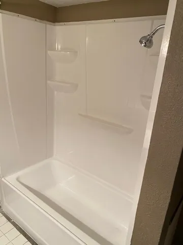 a bathroom with a bathtub
