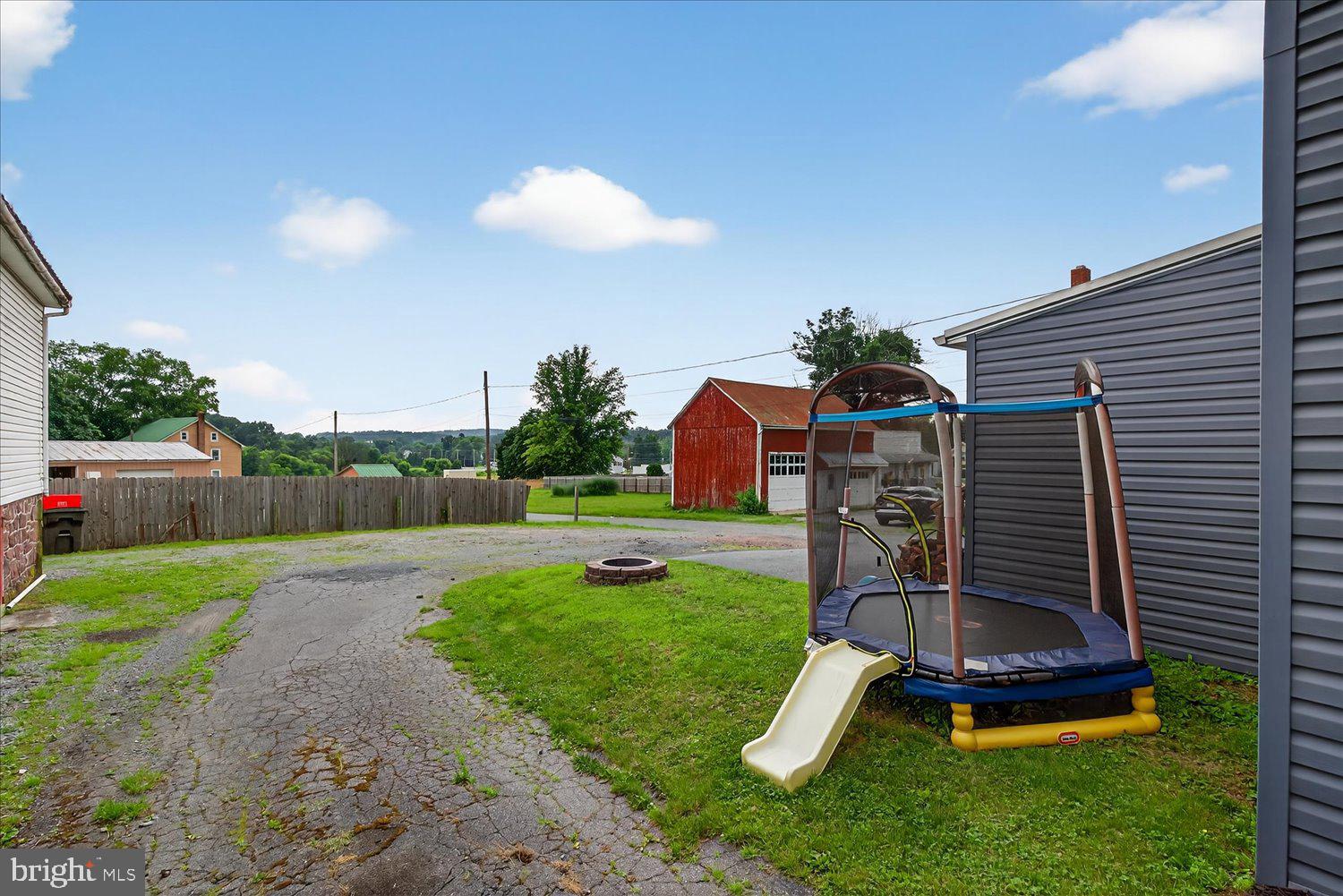 1235 Reading Road Denver, PA 17517 - Photo 30 of 33 a view of a backyard with furniture and a garden