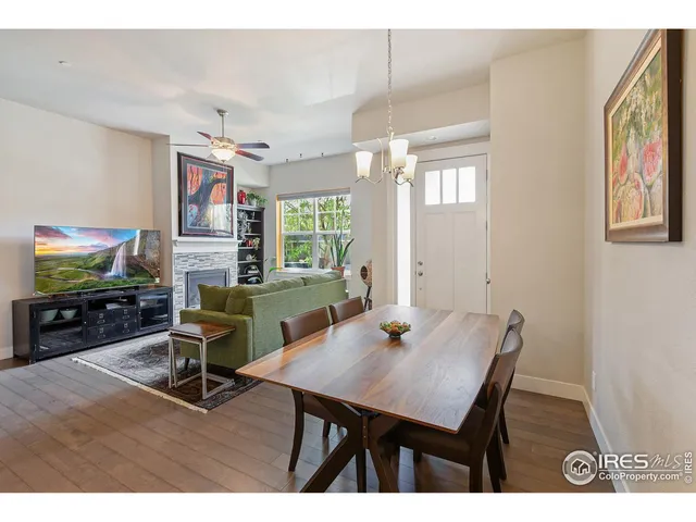 a bedroom with a bed mirror and a window