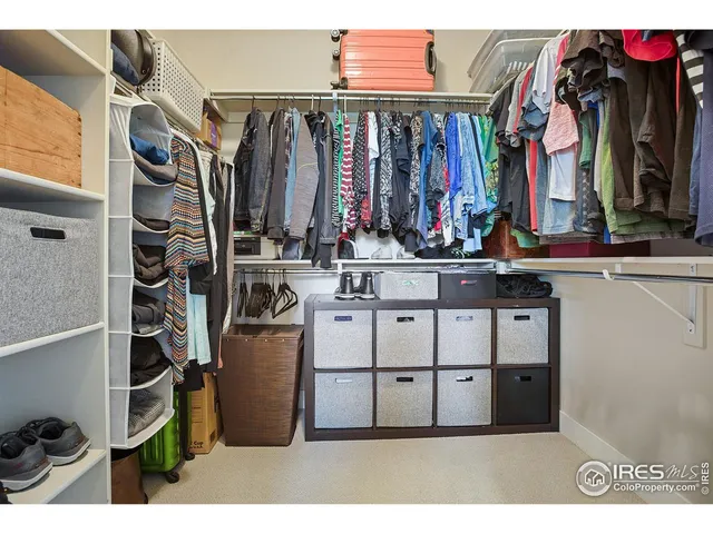 a bathroom with a tub shower and sink