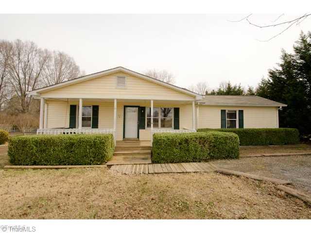 6214 Lisa Drive Oak Ridge, NC 27310 - Photo 1 of 11 Exterior Front.