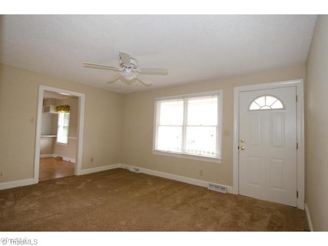 6214 Lisa Drive Oak Ridge, NC 27310 - Photo 3 of 11 Living Room.