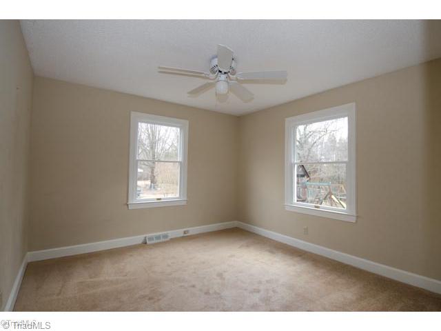6214 Lisa Drive Oak Ridge, NC 27310 - Photo 9 of 11 Master Bedroom.