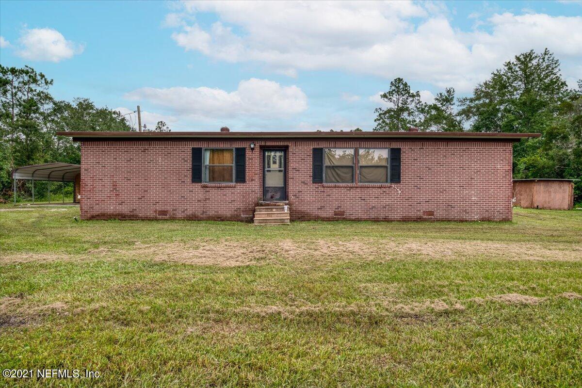140 Keystone Road Palatka, FL 32177 - Photo 1 of 33 a front view of house with yard and seating area