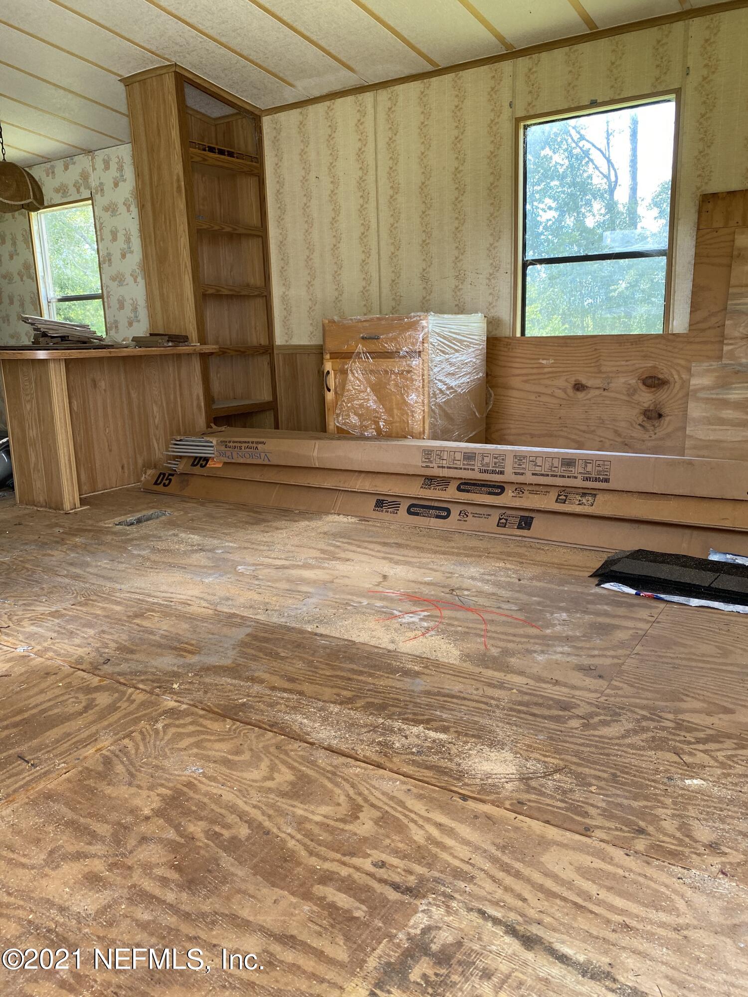 140 Keystone Road Palatka, FL 32177 - Photo 20 of 33 a view of a room with wooden floor and window