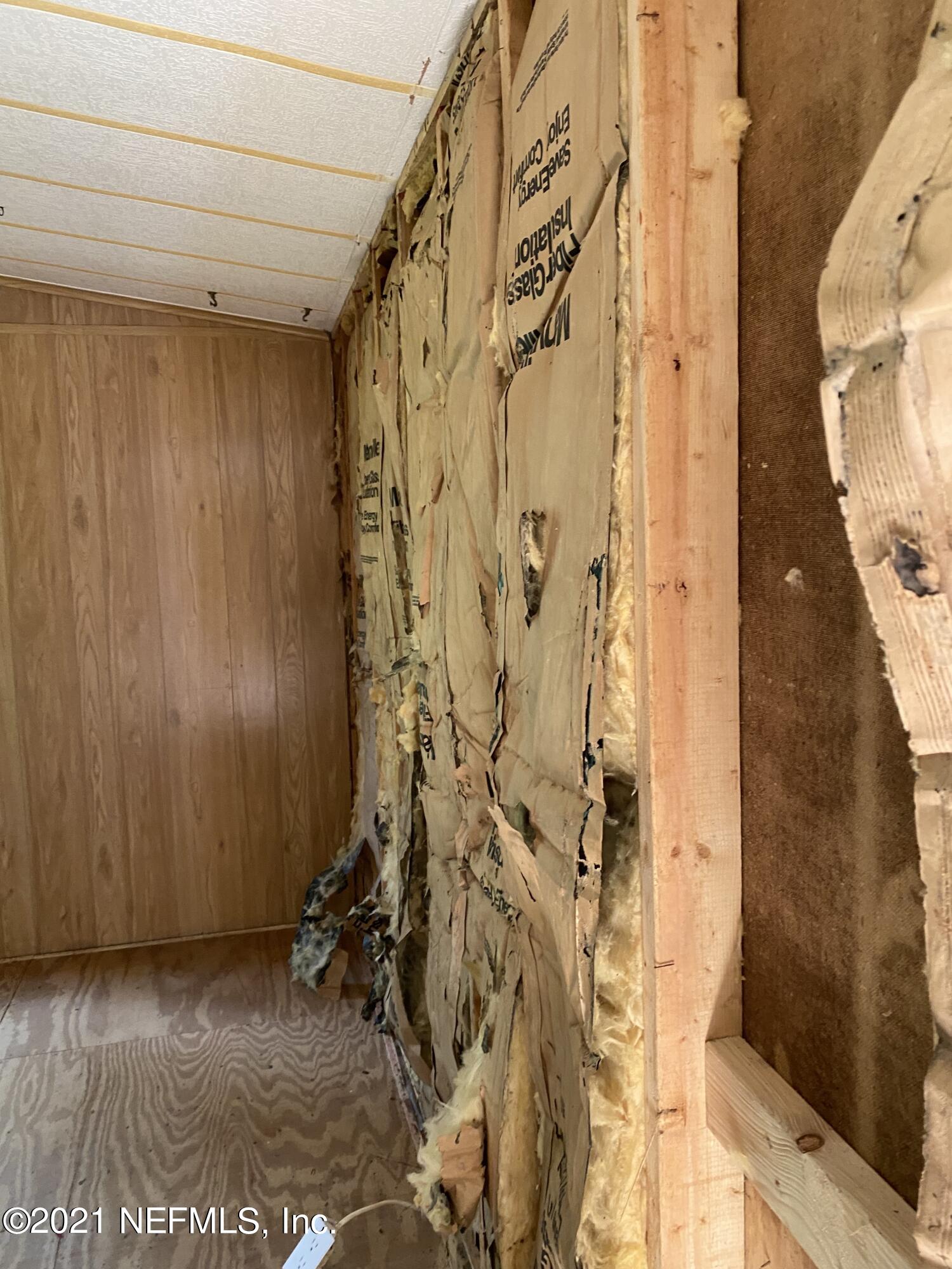 140 Keystone Road Palatka, FL 32177 - Photo 21 of 33 a view of a bathroom with a shower curtain