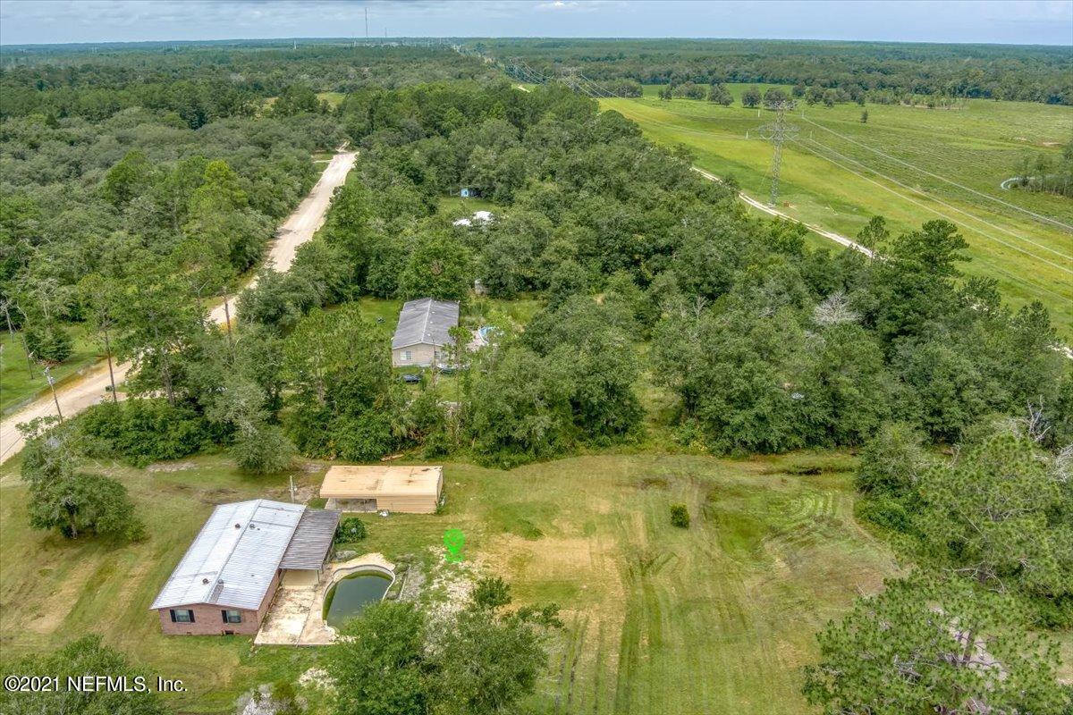 140 Keystone Road Palatka, FL 32177 - Photo 25 of 33 a view of a yard with a swimming pool