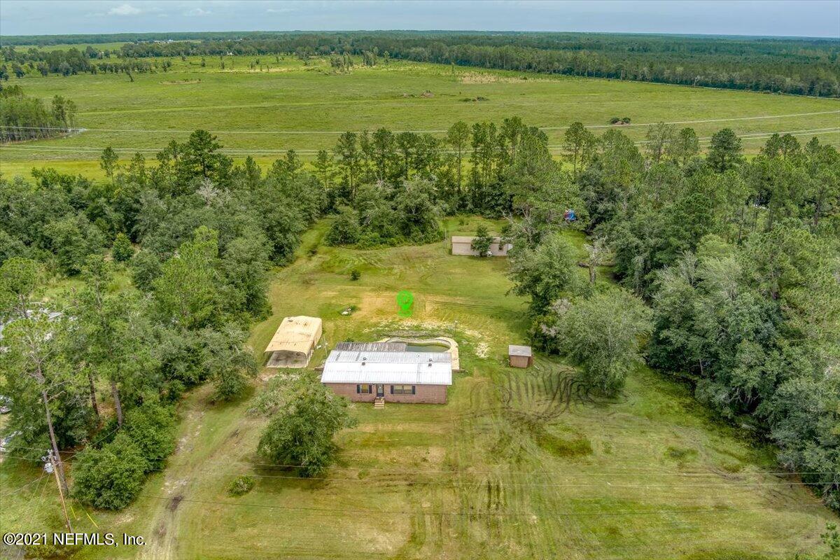 140 Keystone Road Palatka, FL 32177 - Photo 26 of 33 a view of a lake with a houses