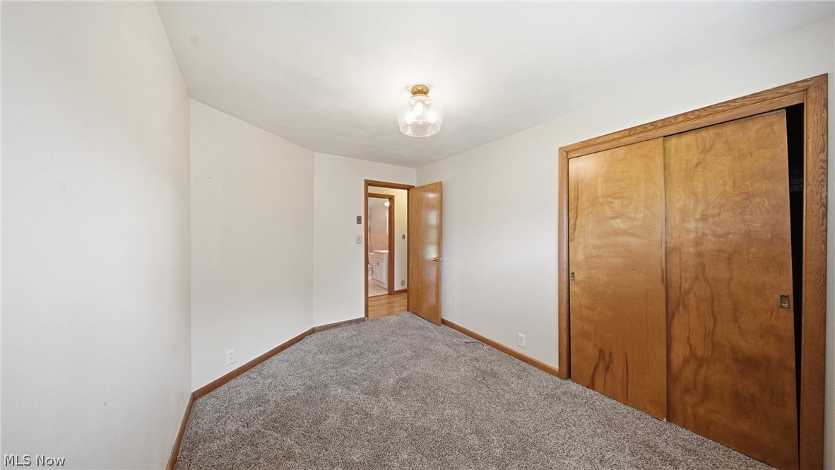 89 Dagg Road Parkersburg, WV 26101 - Photo 33 of 45 Room with white walls, grey carpet flooring, and a flush mount ceiling light fixture