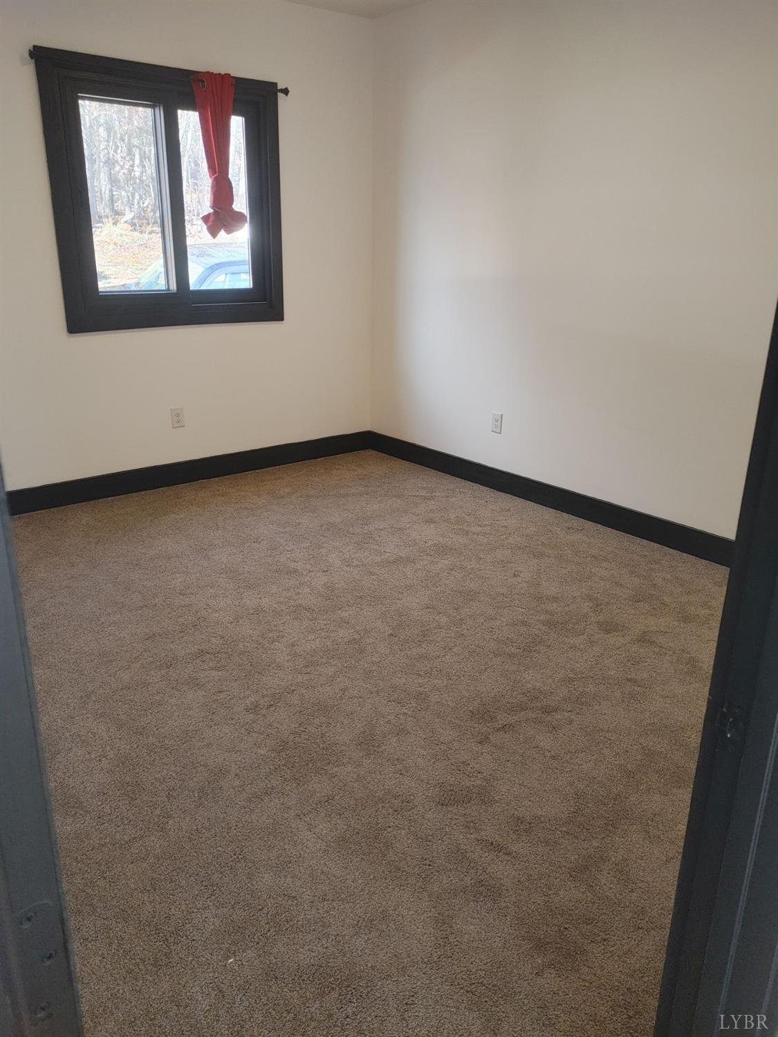 8915 Charlemont Road Goode, VA 24556 - Photo 35 of 96 an empty room with a window