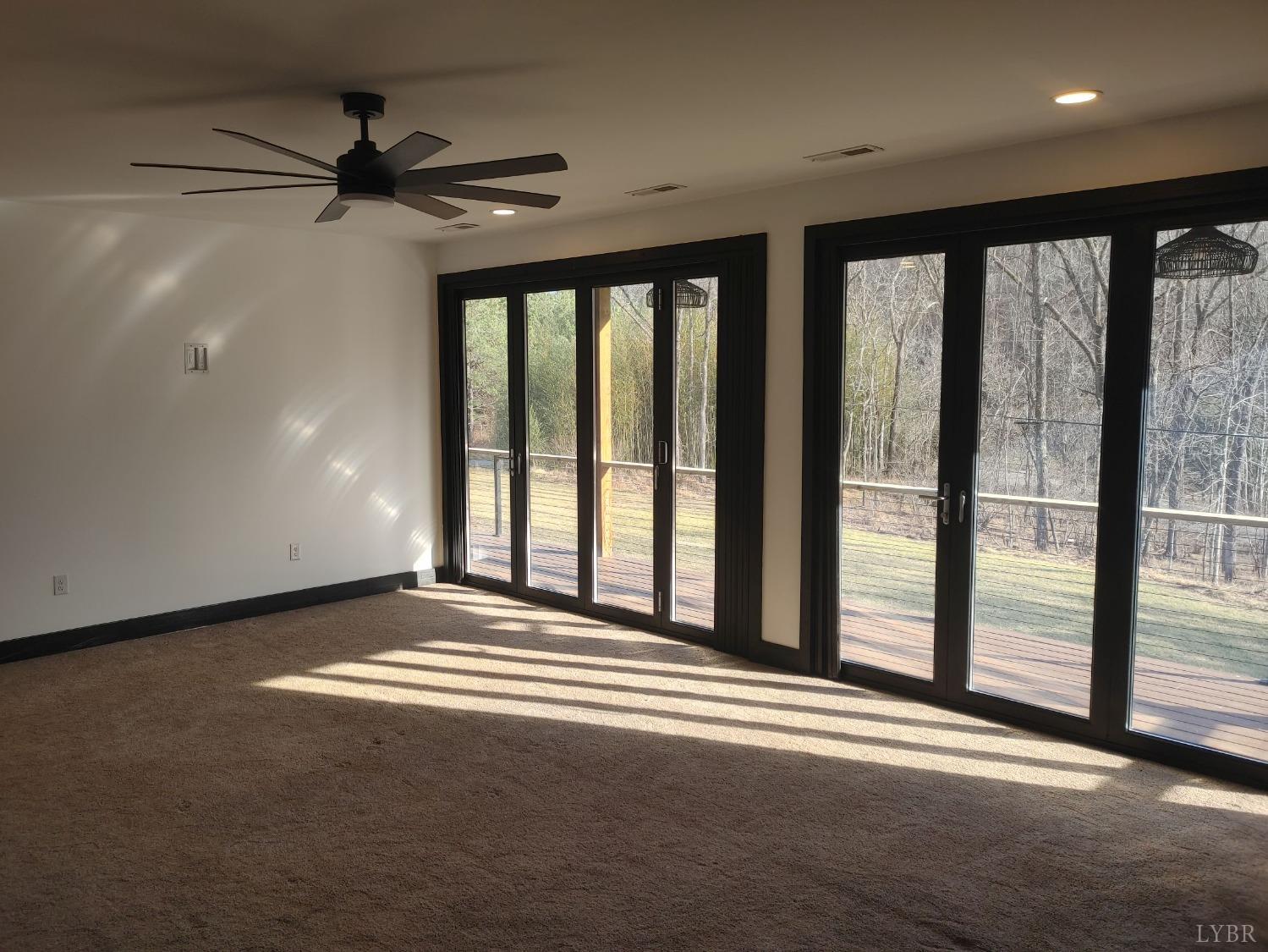8915 Charlemont Road Goode, VA 24556 - Photo 43 of 96 a view of an empty room with a balcony
