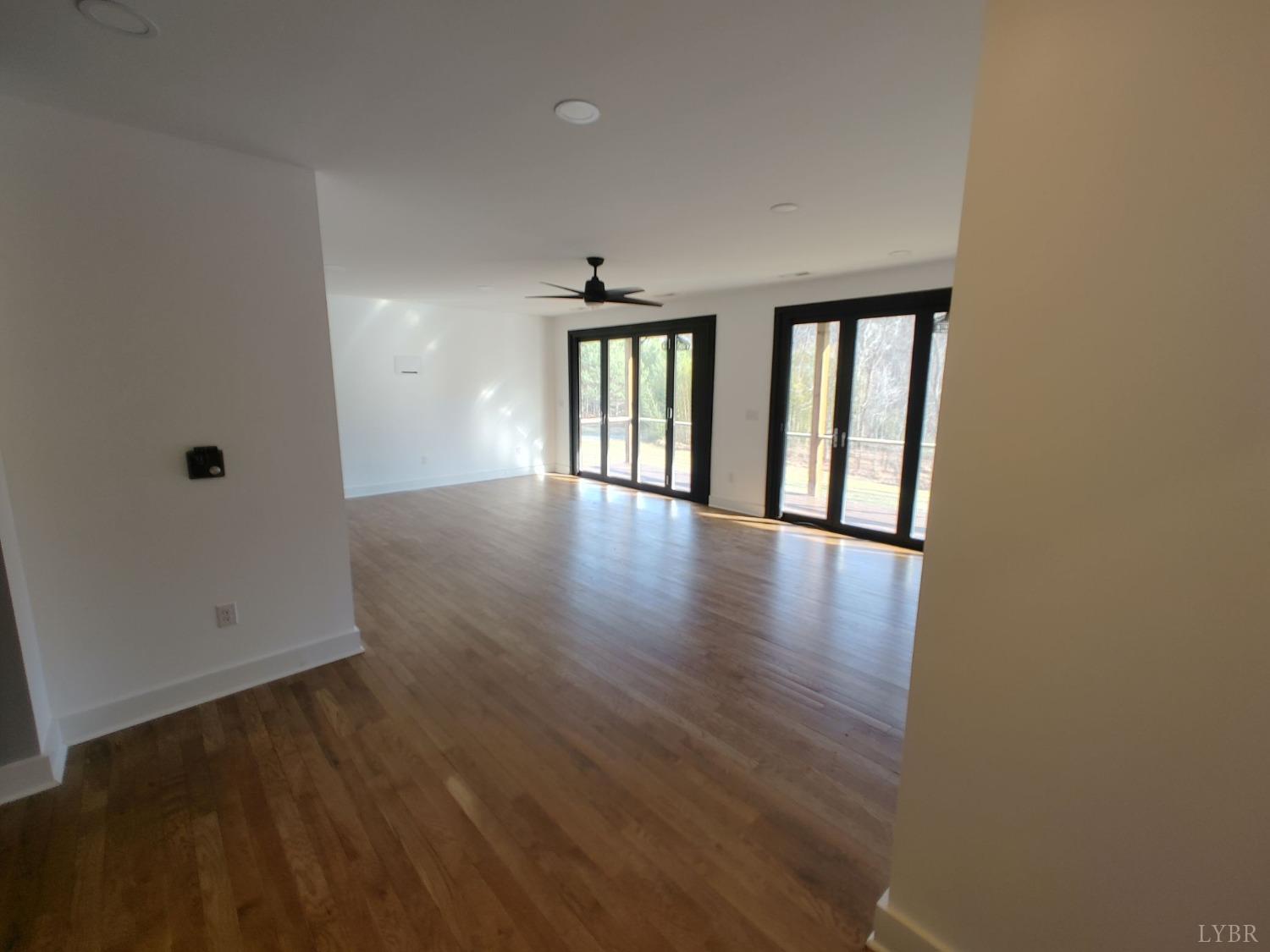 8915 Charlemont Road Goode, VA 24556 - Photo 64 of 96 wooden floor in an empty room with a window