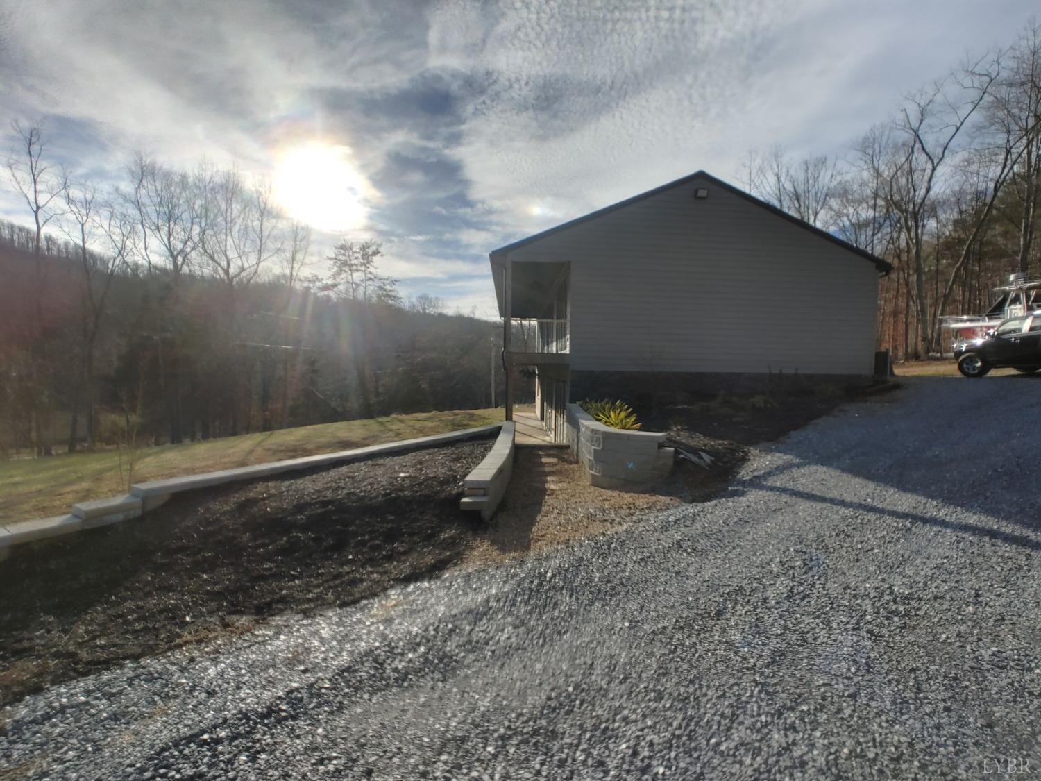 8915 Charlemont Road Goode, VA 24556 - Photo 88 of 96 a backyard of a house