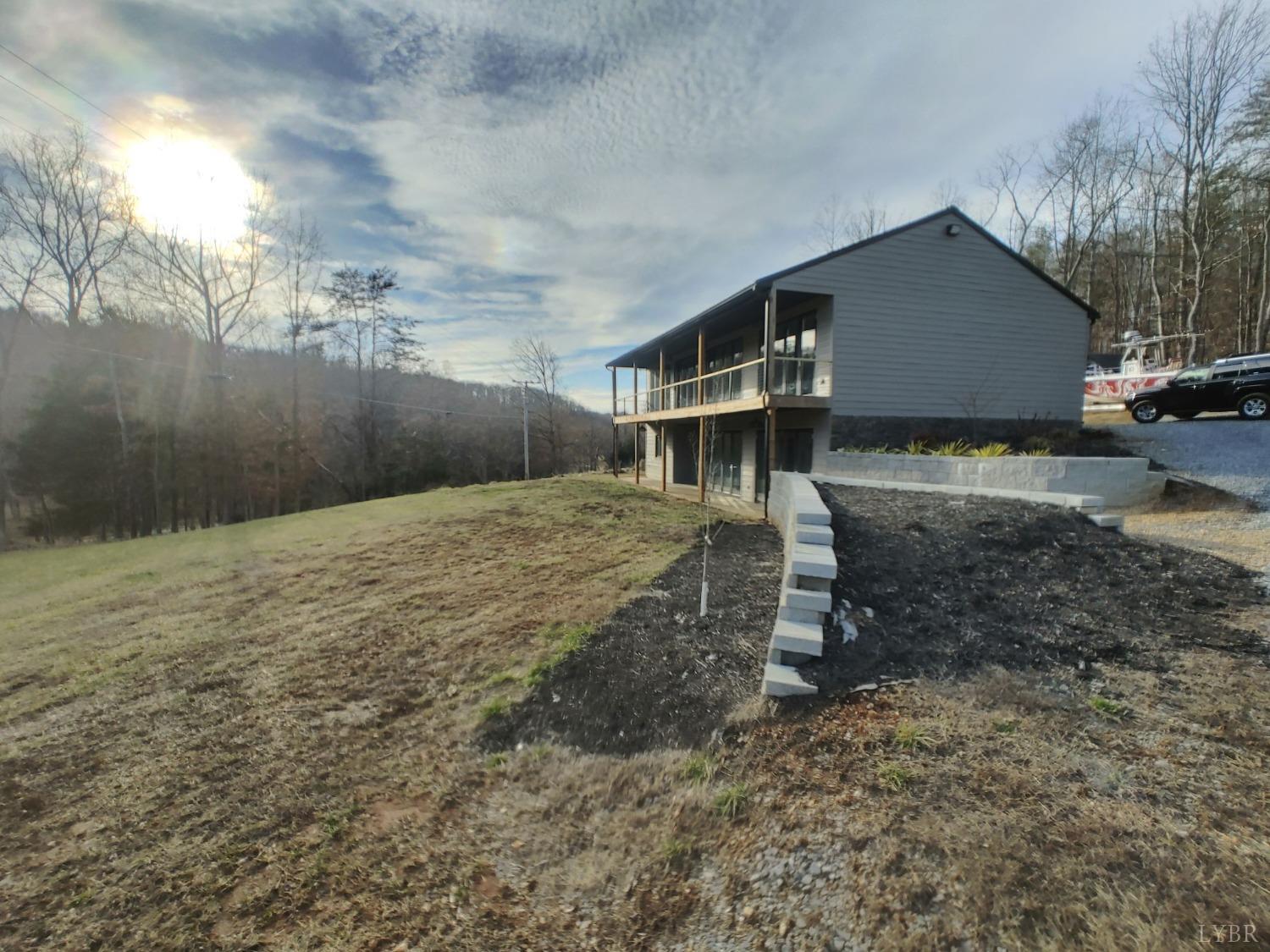 8915 Charlemont Road Goode, VA 24556 - Photo 89 of 96 a view of a house with a yard