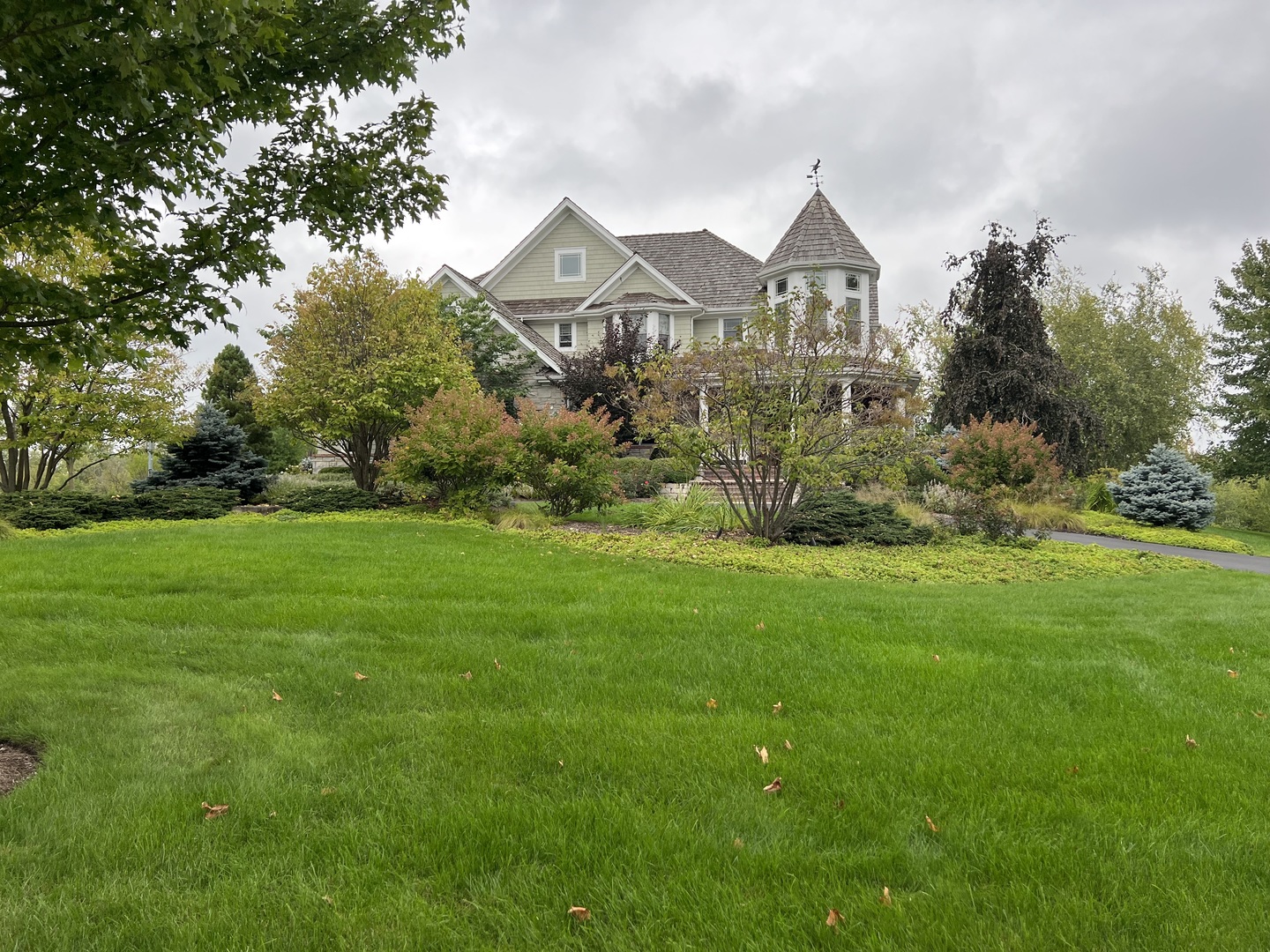 20874 West Summit Drive Kildeer, IL 60047 - Photo 1 of 1 a front view of a house with garden