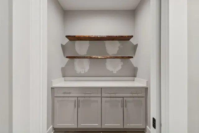 a view of a porch and garden