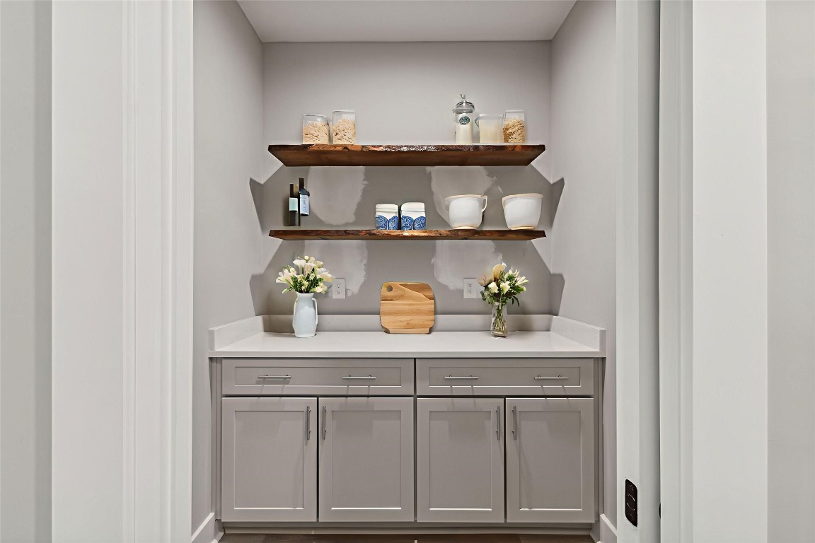 96050 Captains Pointe Road Yulee, FL 32097 - Photo 28 of 37 a kitchen with a sink and cabinets